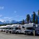 motorhomes in a row with mountains in the background - grey holding tank tips and tricks
